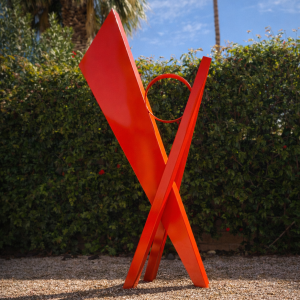 Convergence, a red geometric metal sculpture by Atomic Metalworks